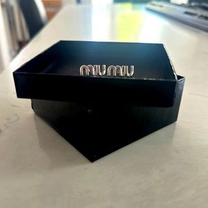 Miu Miu earrings. Enameled metal